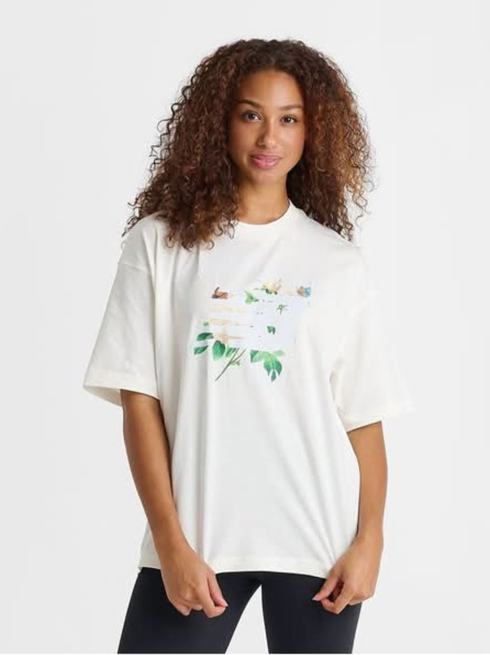 New Balance Cream Graphic Tee with Green Botanical Detail
